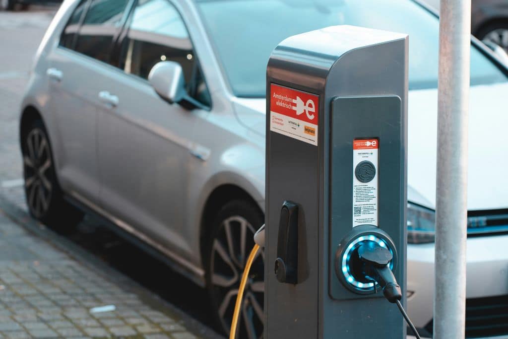 Electric car battery charger on the side of the road